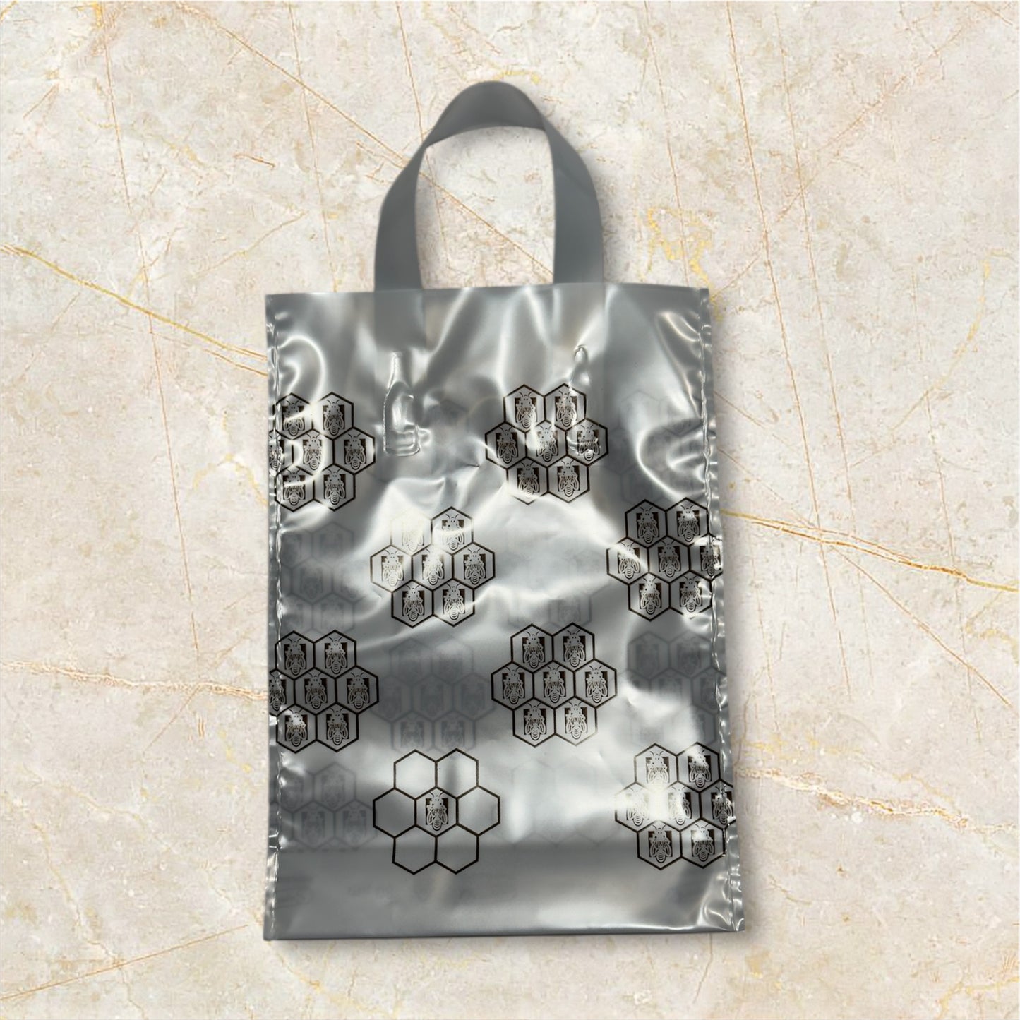 Bolsas de regalo 2×0,5kg (blanca, con panal dorado) - Pack 25 und